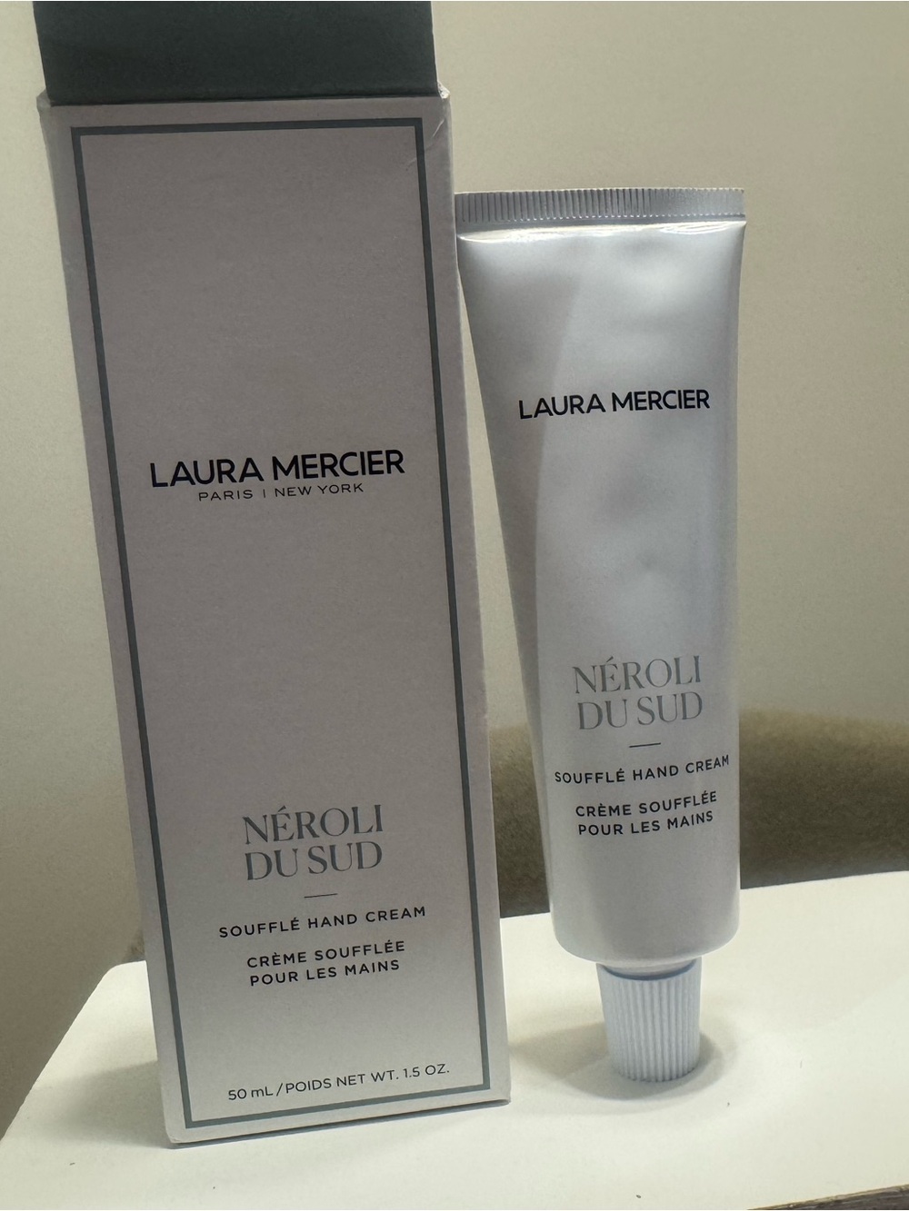 laura mercier White and Silver Hand Cream Tube